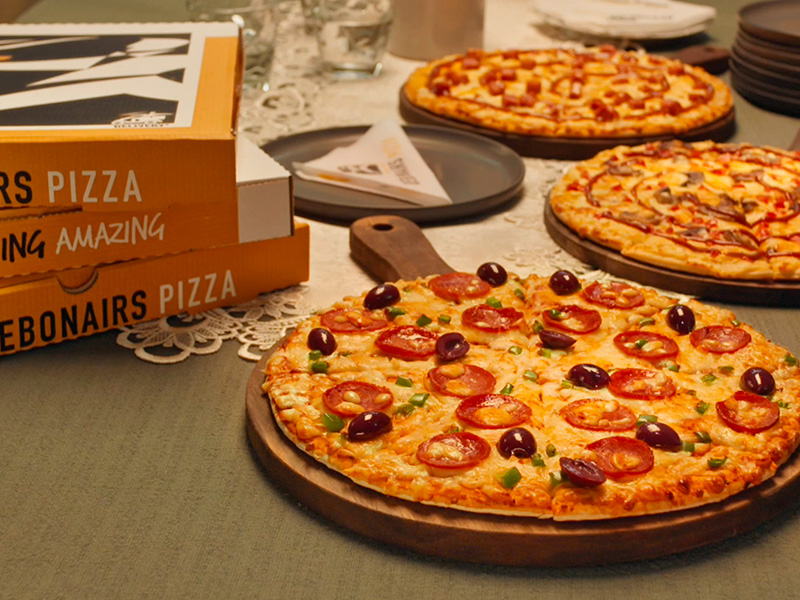 On the double pizza's and delivery boxes